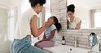 Child skincare, morning and a mother washing face together in the bathroom for grooming. Happy, help and a mom cleaning a girl kid with a facial for wellness and care of skin for beauty in a house