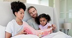 Parents, bed or child reading storybook, fairytale or literature for bedtime, entertainment or child development. Story time, diversity family or learning kid relax with cartoon books in home bedroom