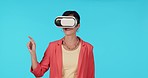 Woman, virtual reality and press on screen with metaverse, futuristic and high tech on blue background. Hand, female user and VR software with future technology and mockup space in digital world