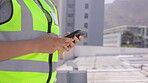 Phone, person and hands of engineer in city, typing or social media on break outdoor on rooftop. Smartphone, architect and contractor texting, communication or networking for planning construction.