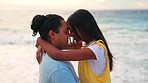 Vacation, hug and couple with love, beach and quality time on holiday, commitment and romantic gesture. Marriage, man or woman embrace, seaside  holiday and dating with relationship and summer travel