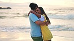 Spinning, hug and couple with love, beach and happiness on holiday, quality time and romantic gesture. Romance, man and woman embrace, seaside vacation and motion with commitment, loving and travel
