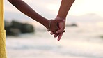 Closeup, beach and a couple holding hands for love, care and support during a holiday by the sea. Travel, trust and a man and woman with affection at the ocean for gratitude or marriage kindness