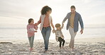 Family, holding hands and dad swing girl on beach, holiday or support for jump and fun, bonding and quality time on vacation. Parents, children and happiness walking together with love or trust