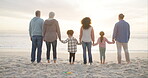 Generations, sunset and beach with back view on vacation with bonding on weekend with children. Big family, summer and holding hands at ocean for love or quality time on holiday and travel together. 