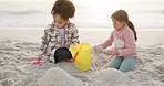 Sand, friends and girls play, beach and travel with happiness, bonding and relax with joy. Female children, kids and toys with coast, summer holiday and vacation with waves, weekend break and youth