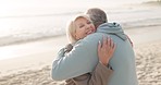 Hug, beach and senior couple with love, smile and romantic gesture with quality time, happiness and travel. Romance, old man and elderly woman embrace, seaside holiday and vacation with adventure