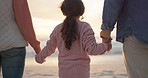 Back, beach and family holding hands, love and happiness with wellness, traveling and holiday getaway. Parents, mother and father with a girl, female child and seaside vacation with love and walking