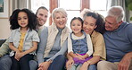 Portrait, family and generations with happiness and love, grandparents with parents and children at home. Care, support and smile, women and men with girl kids, bonding and quality time together