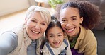 Happy family, smile and selfie on a sofa with mother, grandmother and girl child in their home. Face, love and portrait of interracial women in a living room for photo, bonding and profile picture