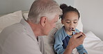 Blended family, medicine and grandfather with a sick girl in the bedroom of a home for care or treatment during recovery. Healthcare, kids and medication with senior man giving cough syrup to a child