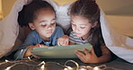 Night, tablet and children streaming a movie, cartoon or show in bedroom, tent or playing a game together in bed. Friends, girls or kids typing on mobile app for online video, movies or internet