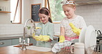 Children, learning and cleaning dishes in kitchen with sister, girl or helping to wash, dry and clean house with soap. Kids, washing and cloth to wipe plates, cutlery or teaching housework to girls