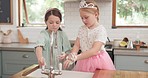 Sisters, girl kids and washing hands with faucet, soap and foam for dirt, germs and together with chat in kitchen. Young children, tap and water for cleaning, self care and safety from virus bacteria