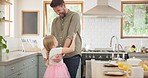 Family, home and father with girl, dance and happiness with bonding, celebration and entertainment. Dad, male parent and daughter with joy, female child and kid dancing, kitchen and loving together