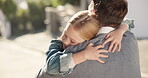 Father, girl and hug in street outdoor, bonding and happy together. Dad, embrace and cuddle with kid, child or daughter for love, care or affection, trust and welcome with family, security or comfort