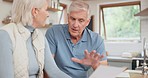 Finance, savings and senior couple on laptop with bills, paperwork and documents for retirement planning. Life insurance, computer and elderly man and woman talking for pension, payment and budget