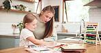 Teach, drawing and girl with tutor for lesson at house or education development or help. Woman, support and kid is learning or creative work or knowledge and notebook at kitchen table for child.