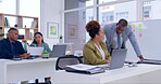 Laptop, collaboration and a mentor with a business black woman in the office for training or introduction to our vision. Computer, teamwork and a male manager talking to a female employee at work