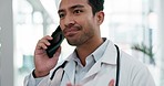 Talking, doctor and an Asian man on a phone call at a hospital for communication and nursing. Healthcare, help and a male surgeon speaking on a obile for advice, support and chat about surgery