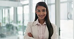 Professional, indian woman and  portrait with confidence or arms at office for success with secretary. Happy,  employee and business person with girl with positive mindset or vision, receptionist.