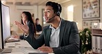 Call center, asian man and communication at computer of consultant for customer service, contact us or working late. Male telemarketing agent consulting at desktop for CRM questions, sales or support