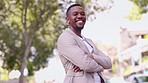 Crossed arms, happy and business black man in city with pride, confidence and excited for job. Corporate worker, professional and portrait of male entrepreneur in town for success, company and career