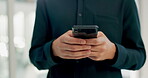 Person, hands and typing on smartphone for connection to social media, internet and website notification in office. Closeup, employee or cellphone for texting, search digital news blog and mobile app