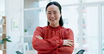 Face, designer and Asian woman with arms crossed, happy or smile in office, startup or company workplace. Portrait, creative or confident professional, entrepreneur or worker from Japan with business