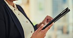 Hands, woman and scroll on tablet in office for planning research, data analysis and internet information. Closeup, female worker and digital technology for online connection, website and network app