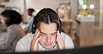 Headache, stress and man at problem at customer service agency, frustrated consultant and sales deadline. Call center consultation, anxiety and agent at help desk, annoyed and working with crm crisis