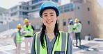 Solar panels, engineering and face of a young woman in the city on a building rooftop for maintenance. Proud, confidence and portrait of Asian female engineer working on photovoltaic cells with team.