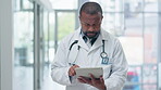 Tablet, black man and doctor typing digital prescription on email online, internet or web in a hospital for medical healthcare. Professional, report and person research medicine or search a website