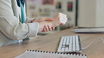 Arthritis, pain in hand and woman typing on computer, keyboard or person working with osteoporosis, fatigue or ache. Sore wrist, joint and businesswoman with orthopaedic or medical problem with hands