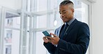 Happy man with cellphone, thinking in office and typing email or social media meme in business networking. Communication, internet and smile, businessman holding phone with mobile app and chat online