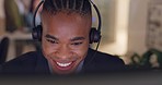 Call center, face and man laughing at computer with a headset for telemarketing, customer service or crm. African male consultant for technical support, sales or advice at a help desk for funny chat