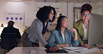 Computer, collaboration and business women talking in office while working late. Teamwork, coaching and diversity female group of employees brainstorming ideas, planning and training at desktop pc