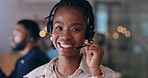 Business woman, call center and portrait with a smile in a office with web consulting. African female person, professional and confidence late with crm project and deadline of telemarketing at night