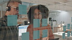 Call center training, consultant or team leader writing on glass wall for brainstorming ideas, solution or goals, Sticky note, collaboration or agents planning in customer service or telecom together