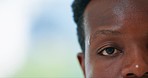 Portrait, eye and depression with a black man closeup on blurred background mockup for mental health. Face, sad and pain with a young male person looking lost, alone or unhappy while worried in grief