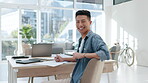 Face, happy man and creative writer in office, startup company or workplace on table. Portrait, author and smile of Asian professional, entrepreneur and employee from Japan with career in business.