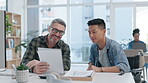 Training, Asian man or manager with documents talking, speaking or planning project in office. Mentorship, teamwork or senior leader reading paperwork or notes with intern worker for admin coaching
