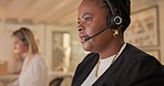 Speaking, call center and business woman, consultant or agent for communication, contact us and night support. Advice, customer service and african person at consulting agency, workspace and solution