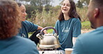 Laughing, tea and a camp volunteer group talking outdoor while planning at an outreach program for the community. Woods, nature or coffee with counselor friends sitting outdoor speaking about charity