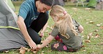 Child, camp counsellor and tent help outdoor with support from a girl while camping, Nature, smile and survival education with young children and woman together with freedom and youth knowledge