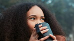 Thinking, nature and a woman with coffee on vacation, relax and camping in the woods. Calm, idea and a young girl drinking tea in the morning in a forest during a holiday in winter for travel