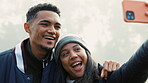 Selfie, love and a couple hiking in nature together for adventure, fun or to explore the wilderness. Photograph, travel and young people bonding while posing for a profile picture on social media