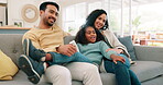 Family, girl kid and parents watching tv on sofa in home for movies, film broadcast and relax in living room. Mom, dad and talking to happy child with television media, show or streaming subscription