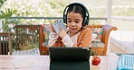 Headphones, home school and girl with education, online classroom and talking with elearning, study and notes. Female kid, student or child development with a tablet, headset or knowledge with growth
