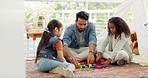 Building blocks, father and girls play, love and happiness with bonding, loving together and quality time. Family, dad or female children with male parent, home or kids with toys or child development